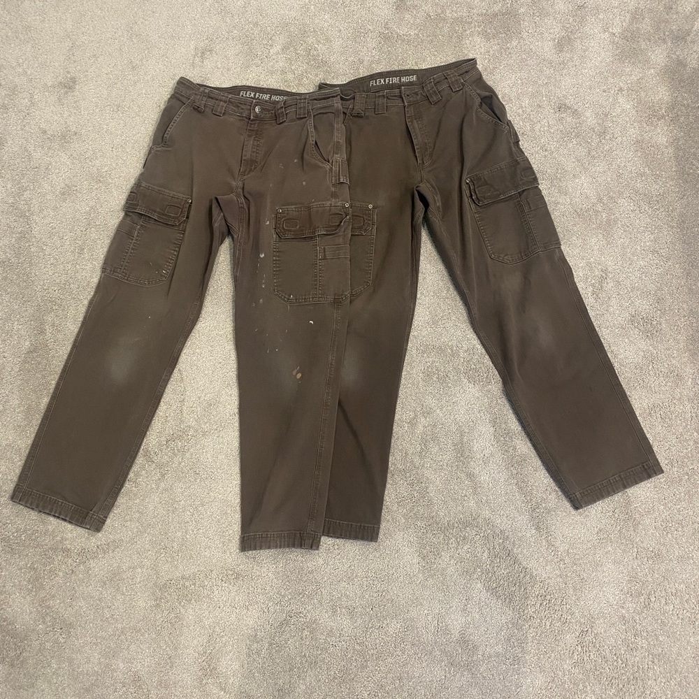 Two pairs of Duluth Flex Fire Hose Relaxed Fit Pants size 33 x 34